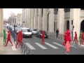 Red and Green morph men crossing road