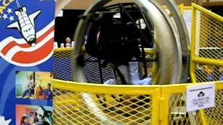Taking a spin with Space Camp in Multi-Axis Trainer at ISDC 2011 in Huntsville, AL