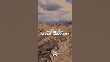 The essence of our mountains, ancient stone guardians, protects the beauty of our vineyards.