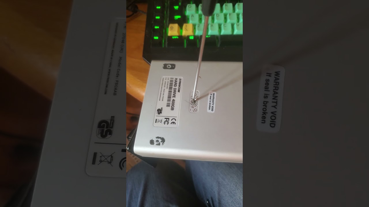 Dismantling a Freecom 27048 HD enclosure. hidden screw!!