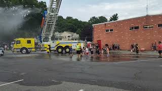 Kids at Roxbury wet down