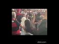 Two catholic Flamengo fans celebrate a goal in the stands