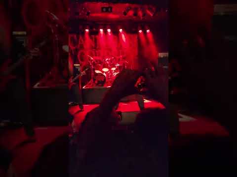 Corpsegrinder defending his headbanging championship