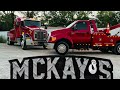 Mckays wrecker lifting a trailer