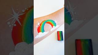 Super easy rainbow face painting design #facepaint #art #rainbow #makeup #drawing #paint #colour