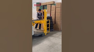How to unload heavy tires from a container easily #conveyorsystem #conveyor #loadingcontainers