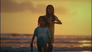 Bermain Ombak saat sunset di Kuta