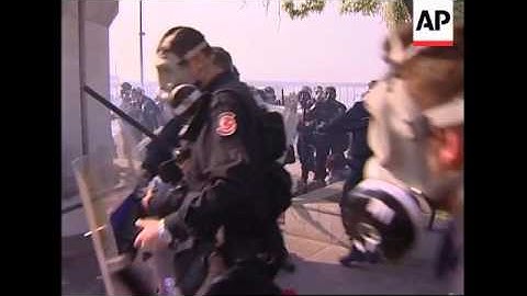 Police fire tear gas, water cannon in May Day disturbances