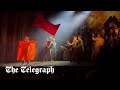 Just Stop Oil disrupt Les Miserables by jumping up on stage