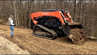 Amazing what 11,500 lbs and 96 HP can do Kubota SVL972 Cut and Fill