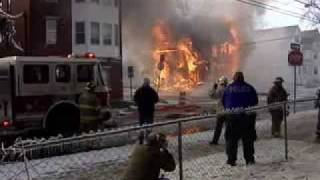 RAW VIDEO: Downed power lines burn down Schenectady grocery (2008)