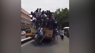 Startling video of Chennai college students falling off roof of moving bus Startling video of Chennai college students falling off roof of moving bus