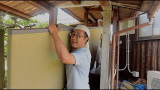 The process of reupholstering tatami mats in a temple. Historic temple built 450 years ago.