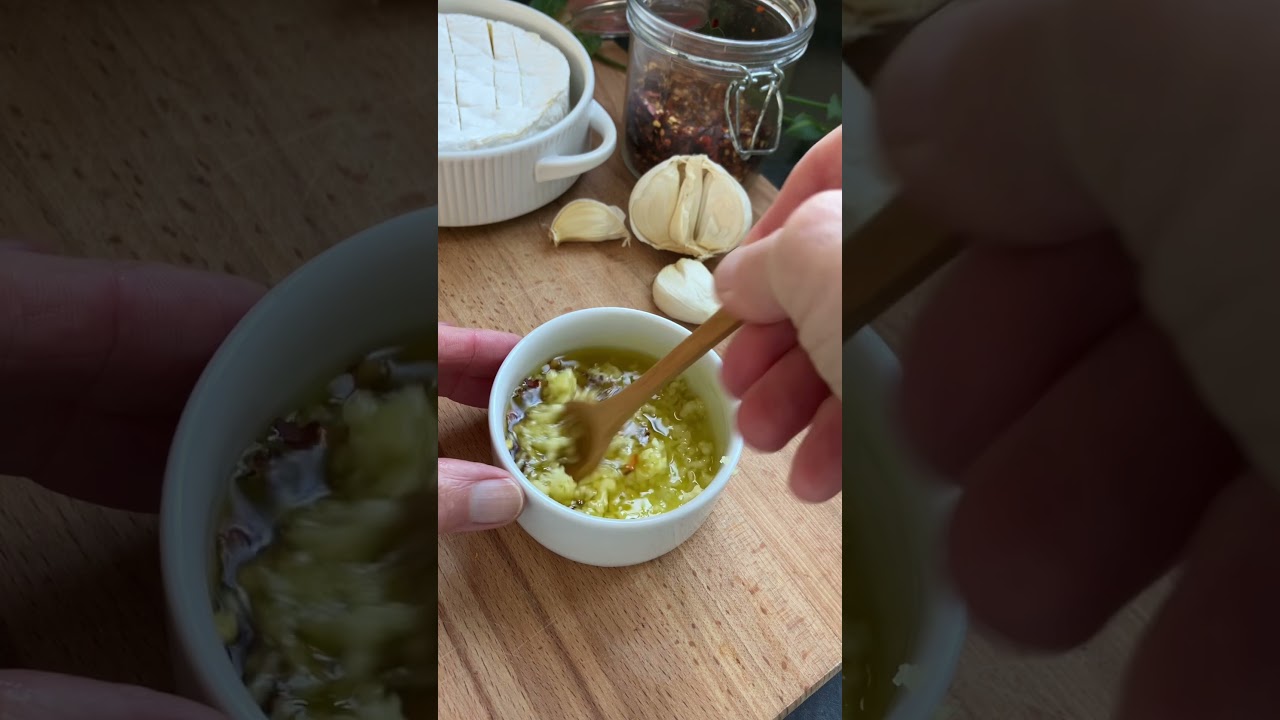 Melted brie with garlic, chilli flakes and olive oil