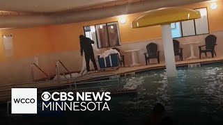 North Dakota hotel worker caught on video apparently washing sheets in hot tub