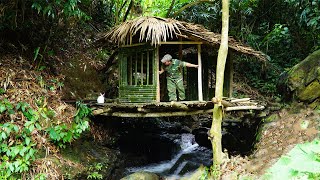 Finishing the wall of a bamboo Bushcraft house in the deep forest.