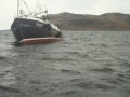 fishing boat on rocks near campbeltown irish boat