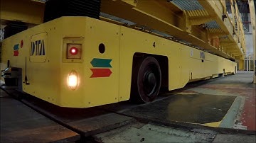 Omnidirectional AGV with magnetic stripe for handling steelmill components