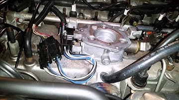 89 Jeep Comanche butterfly stop adjustment on throttle body