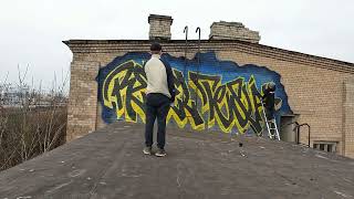 Graffiti bombing. Rooftop on train line and more