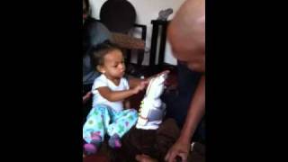 1 year old baby cusses her father out in baby talk. Hilarious!!! Baby Tyce