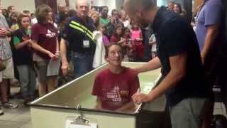 Emily getting baptized 8–30 – 2015
