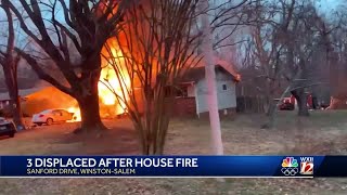 Winston-Salem fire crews battle house fire on Sanford Drive
