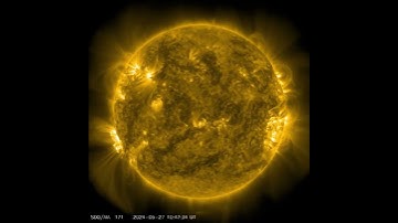 Solar X-Flare as Famous Active Region Returns