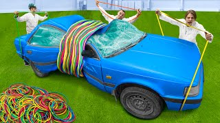 WE CRUSHED A CAR WITH 3-FOOT RUBBER BANDS!
