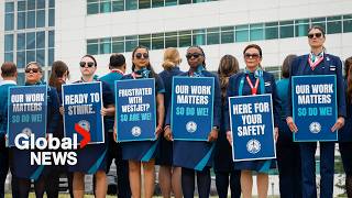 WestJet flight attendants hold information pickets as strike vote takes place