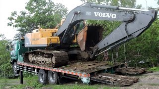 Fuso Self Loader Truck Transporting EC210B Volvo Excavator