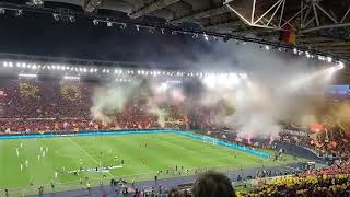 Roma fans chant anthem and choreo before the Europa League match against Leverkusen