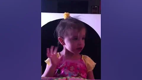 Emery telling a story while eating