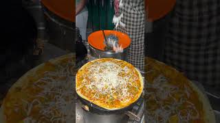 Tasty Cheese Dosa At 99 varieties of dosa at Halasuru #halasuru #cheesedosa #viralvideo #bengaluru