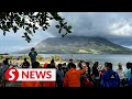 Indonesia issues tsunami warning after ruang volcano eruption peaks