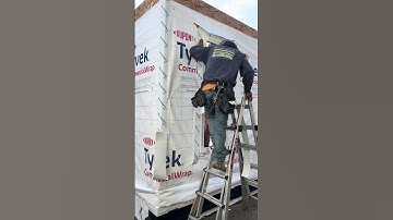 Window opening preparation in the water proofing barrier in a mockup in Shoreline Wa.