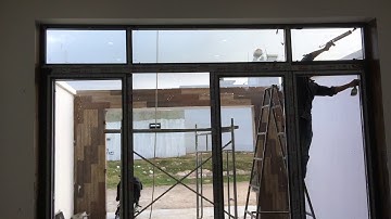 Bắn keo cửa nhôm