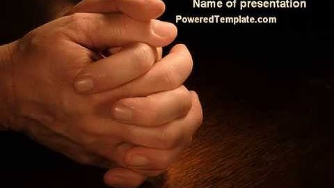 Clenched Hands PowerPoint Template by PoweredTemplate.com