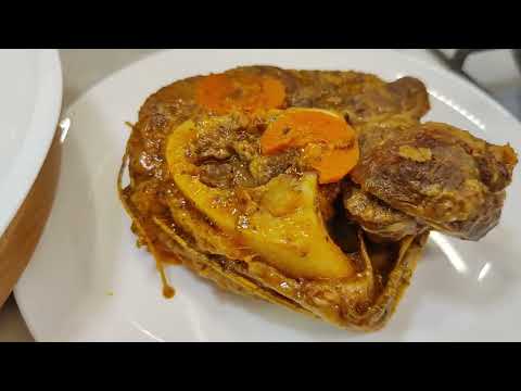 Osso Buco (beef with bone) with gremolata - Italian dish