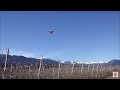Drone in the countryside with the backdrop of the alps