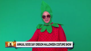 Andy Carson tries on costumes courtesy of Goodwill Information