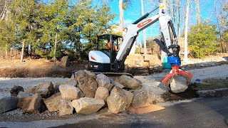 retaining my gravel driveway with boulders