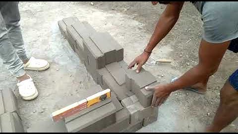 Making corner with Hydraform Interlocking blocks # 9312578095/9810298913