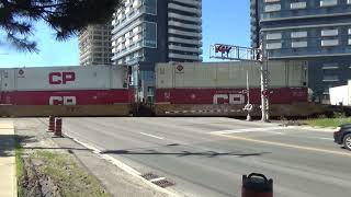 CN & CPKC 118 intermodal stack trains meet at Islington & Steeles.
