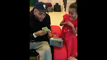 Chris Brown Gives Cash To Royalty 