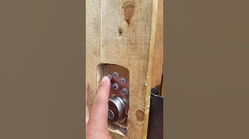 Electronic deadbolt on an outdoor walk gate and for added protection new steel posts set concrete.