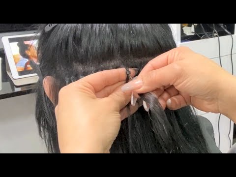 Video: Cómo colocar extensiones de cabello con microanillos (con imágenes)