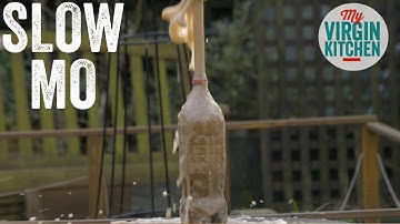 SLOW MOTION MENTOS IN COKE ERUPTION