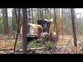 hydroaxe 670 feller buncher cutting trees