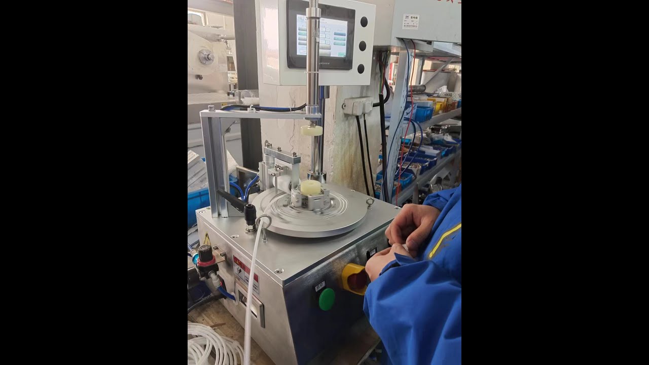 Guide wire sheathed tube coiling machine